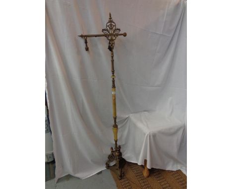 A BRASS AND ONYX STANDARD LAMP 
