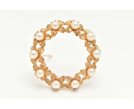 A 9CT GOLD CULTURED PEARL BROOCH, designed as a wreath of ten flowers each set with a central cultured pearl, each approximat