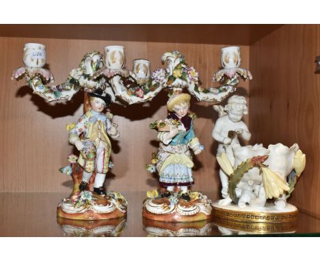 A GROUP OF THREE NINETEENTH CENTURY CERAMIC ORNAMENTS to include a restored Moore's Brother's cherub centrepiece bowl with gi