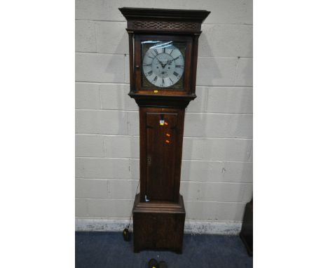 A GEORGIAN OAK EIGHT DAY LONGCASE CLOCK, the box hood with Corinthian style pillars, flanking a glass door, that's enclosing 