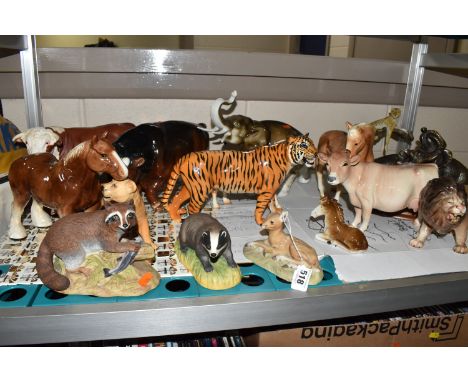 A GROUP OF ANIMAL FIGURES to include two Beswick figurines comprising a tiger No. 2096, a lioness facing right No. 2097 three