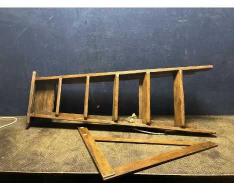 A SET OF VINTAGE WOODEN STEP LADDERS 136cm long and a wooden framing square (2)