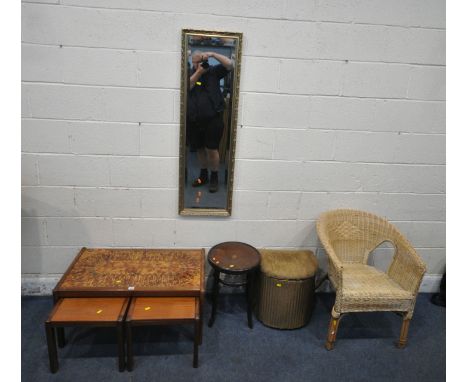 A MID CENTURY TEAK TILE TOP NEST OF THREE TABLES, a bentwood stool, a Lloyd Loom linen basket, a wicker chair, and a rectangu