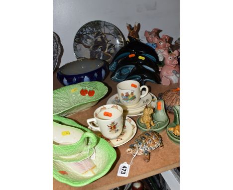 A GROUP OF NOVELTY CERAMIC ITEMS to include a Beswick salad style bowl, dish, a sauce boat with stand, a Beswick nursery rhym