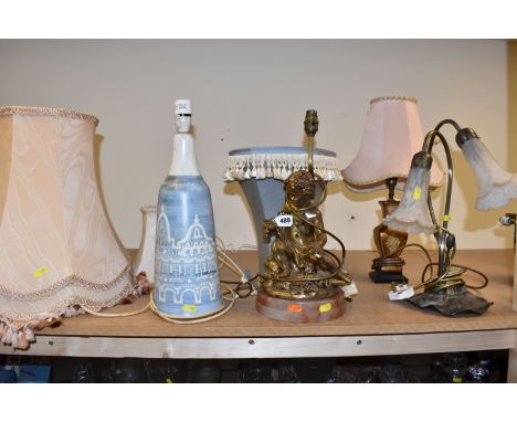 A GROUP OF FOUR TABLE LAMPS AND SHADES, comprising a Tiffany style lamp with two mottled glass flower head shades and metal f