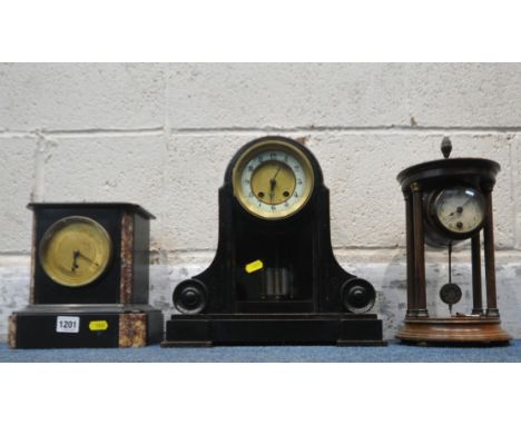 A 19TH CENTURY SLATE MANTEL CLOCK, the circular glass door enclosing a 4.5 inch brass dial, width 22cm x depth 14cm x height 