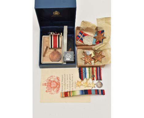 ASSORTED WORLD WAR II MEDALS, to include a boxed 1939-45 Star, Atlantic Star, Africa Star, 1939-45 War medal, a set of four m