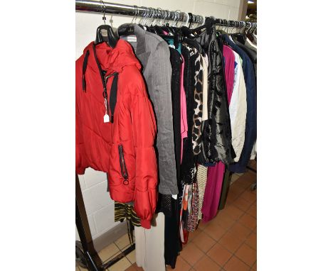 A QUANTITY OF LADIES' CLOTHING, comprising approximately fifty nine items of clothing comprising dresses, jackets, tops, suit