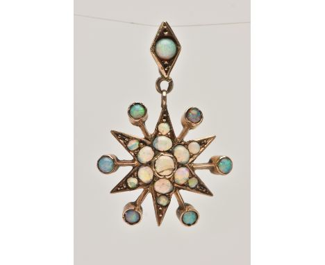 A YELLOW METAL OPAL CABOCHON PENDANT, star shape pendant set throughout with opal cabochons, fitted with a diamond shape bail