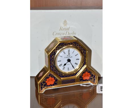 A BOXED ROYAL CROWN DERBY OLD IMARI MANTEL CLOCK patterned in 1128, with red back stamp and LVI (1993) date cypher (1) (Condi