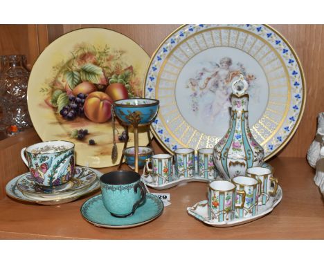 A GROUP OF CERAMICS, comprising a Limoges hand painted liqueur set of decanter (stopper repaired, with loss to end) and six c