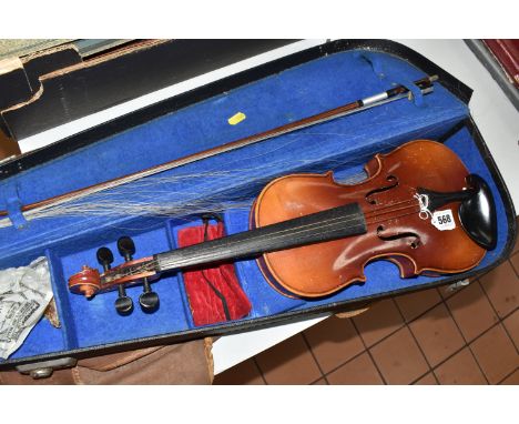 A QUARTER SIZED VIOLIN, 18.5 inches/51.5cm long, suitable for children aged five to seven, length of back 32cm, paper label i