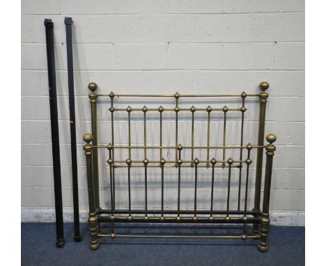 A VICTORIAN STYLE BRASS 5FT BEDSTEAD with iron side rails (condition:- discoloration to parts of the brass some loose parts)