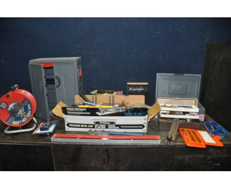 A BOX AND A PLASTIC TOOLCHEST CONTAINING TOOLS including a Stanley No 4 plane, a Record 18 Stilson, a Rabone spirit level, a 