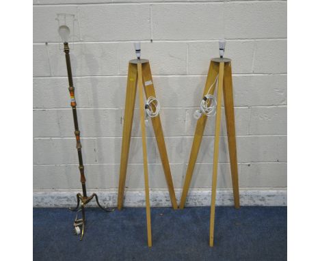 A BRASS AND ONYX STANDARD LAMP, raised on three shaped legs, height to fitting 131cm, along with a pair of beech tripod floor