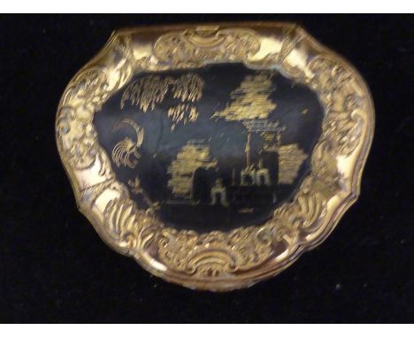A gilt metal snuff box, in Louis XV style, of bombe form decorated with foliate scrolls and on three 'scallop' feet, the cove