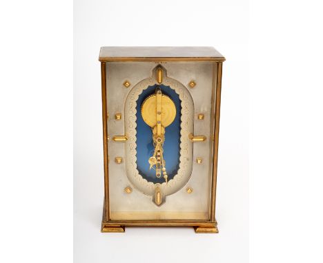 Jaeguer-LeCoultre "Skeleton" Art Deco style travel clock in brass and glass, circa 1960. 14.5 x 9 x 5 cm.