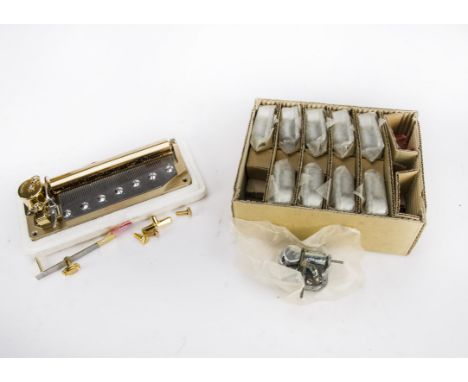 Musical movements, new: a new Opus III musical movement, playing three airs, in maker's poystyrene package with screws and co