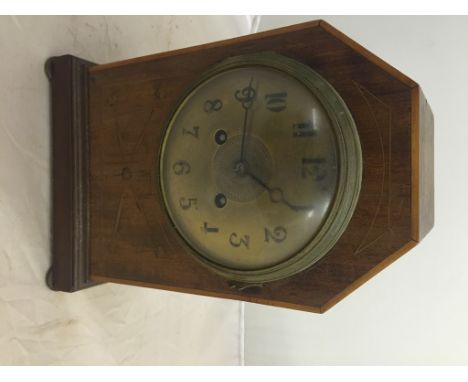 An Edwardian mahogany mantel clock