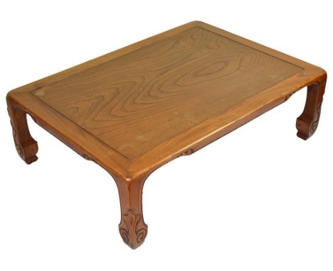 A Chinese Hardwood Table:Low level table on swept & carved scroll pattern legs.H 33cm x L 106cm x D 75   CONDITION REPORT:  N