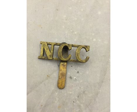 A badge: "Non Combatants Corps" cap badge for those unwilling, through religious or personal reasons to take up arms: a rare 