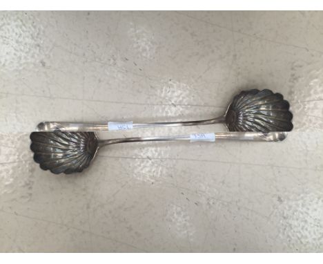 A mid 18th century silver punch/soup ladle stamped four times with makers mark only IC beneath 2 stars