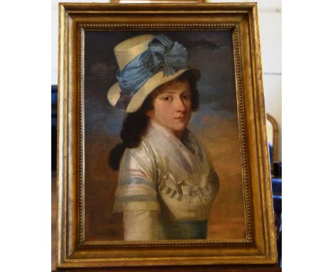 A 19th century oil on canvas portrait of a young woman wearing a cream hat with blue ribbon and a cream and blue dress.  14½ 