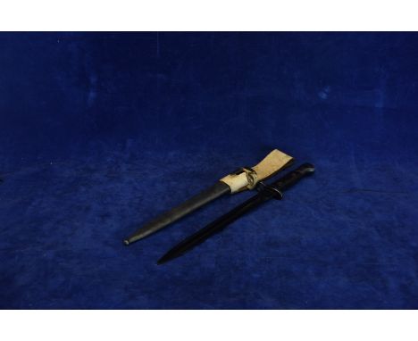 A German bayonet with wooden grip and blued 11ins blade, stamped Simson & Co Suhl, together with its scabbard and white leath