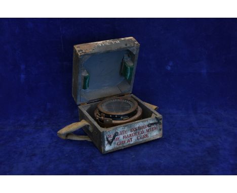 A military compass type PII number 55821H in a grey painted travelling case. Est £20-30