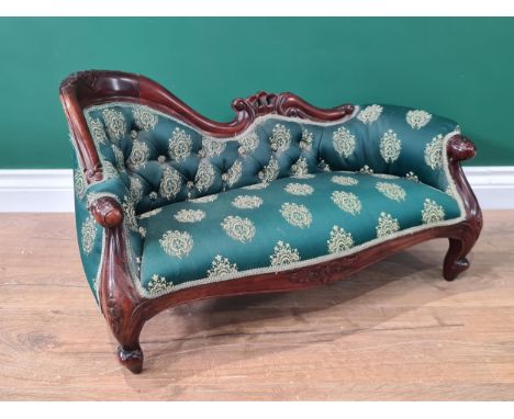 A Victorian style mahogany framed Child's Chaise Longue with green button upholstery on cabriole supports, 2ft 1in
