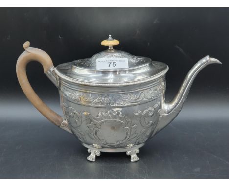 A George III silver oval Teapot floral and leafage scroll engraved, pear wood handle on paw feet, London 1802, maker: R Chawn