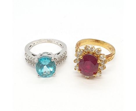 Two Dress Rings, set blue stone and diamonds and ruby and diamonds respectively both ring size M 1/2, set in 14ct gold, total