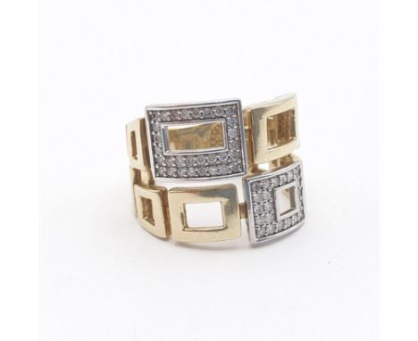 A geometric design gold and diamond Ring, pavé-set brilliant-cut diamonds set in white 9ct gold pierced gold panels set betwe