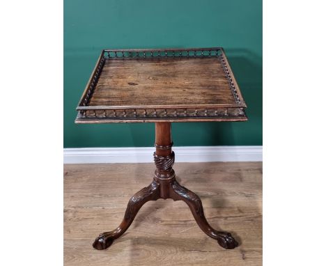 A Georgian Chippendale style mahogany Galleried Tripod Table, with tilt top, raised on turned column and carved splayed suppo