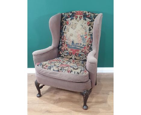 A Gainsborough style upholstered Wingback Armchair with tapestry backrest and seat cushion with outswept arms and wide seat, 