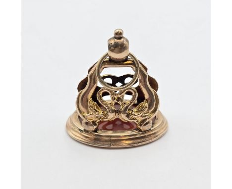 A Victorian Fob Seal having carved carnelian intaglio of pair of birds atop a plinth set in gold metal mount (tests as 9ct) f