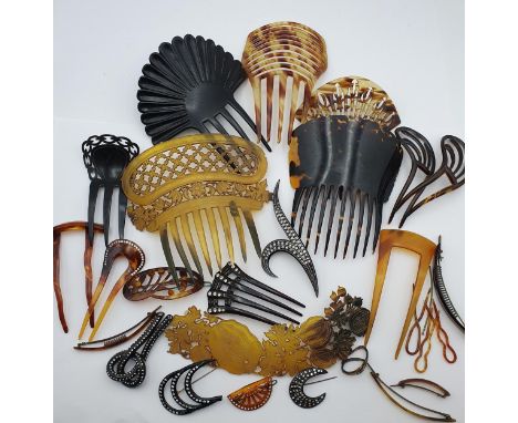 A collection of tortoiseshell type Hair Combs including a finely carved Manilla Hair Comb and a selection of Art Nouveau and 