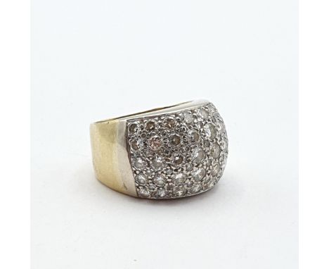 A 1960s Diamond Bombé Ring pavé-set brilliant-cut diamonds in white metal setting on a heavy yellow metal shank stamped 750, 