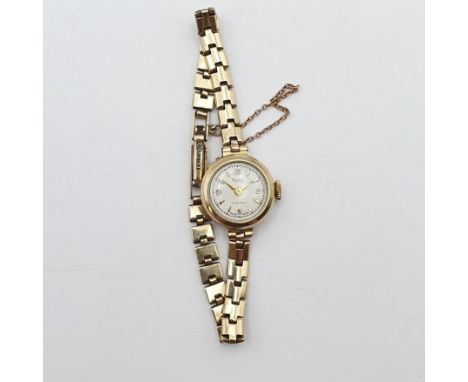A vintage Rone lady's Wristwatch, the cream enamel dial having Arabic numerals at the quarters and baton markers between, cas
