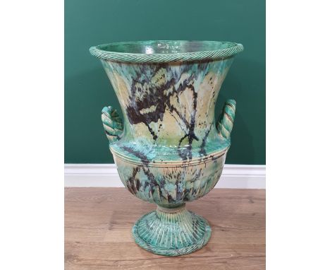 A large ceramic two handled campagna Urn Vase with green marbled design by Marion Brandis, 2ft high, Impressed under M.BRANDI