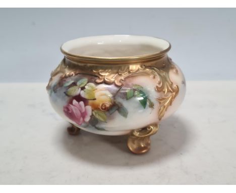 A Royal Worcester Bowl on three scroll feet, painted floral design, No. 183, and a Vase with fluted rim, painted fruit, No. G