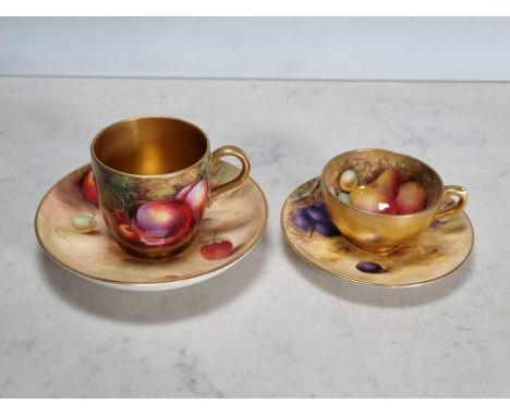 A Royal Worcester fruit painted Coffee Cup and Saucer, painted peaches, apples, cherries and berries, saucer signed 'Moseley'