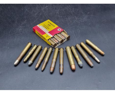 A collection of inert vintage big game Cartridges including box of .500 Nitro