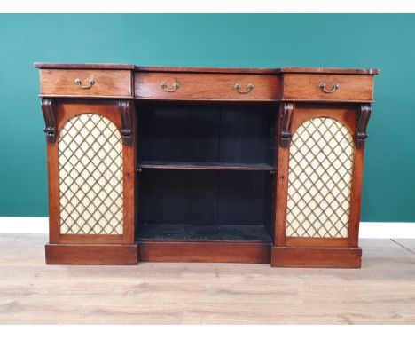A 19th Century rosewood Side Cabinet, the inverted breakfront fitted three frieze drawers above an open shelf, flanked by a p