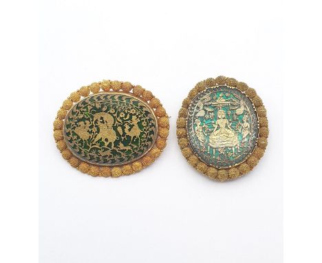 Two 19th century Indian Thewa Pratapgarh Brooches one depicting Shiva (50 x 43mm), the other a hunting scene (56 x 47mm) in c
