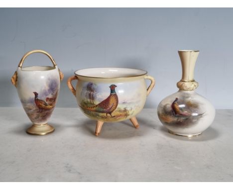 A Royal Worcester basket Vase, with moulded lion heads, painted pheasants in a landscape, 5in H, No. 6/50, another Vase of ba