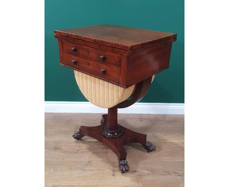 A 19th Century rosewood Sewing/Card Table with foldover top, fitted two frieze drawers above a slide-out basket, raised on oc