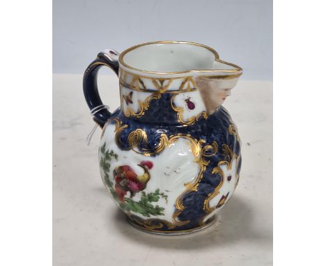 A 19th Century Samson of Paris Milk Jug in the manner of Worcester first period, decorated with an exotic bird sitting on a b