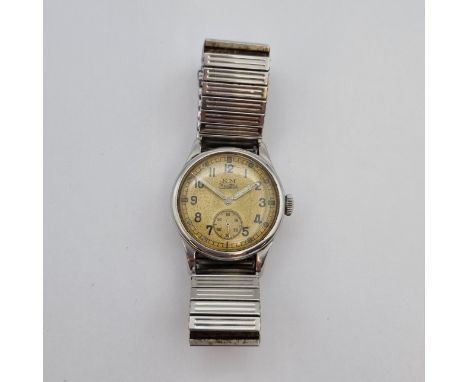 A vintage military issue 'Kriegsmarine' Wristwatch the circular cream dial with arabic numerals and luminous dot markers, lum