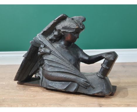 A 17th Century oak carving of an Angel with quill 21in x 16in